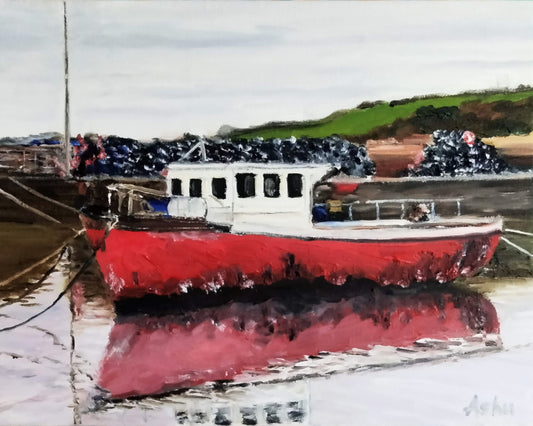 An Ireland scene of a red fishing boat docked in the harbor, with the background of misty morning skies