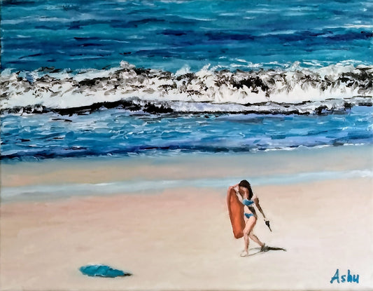 Woman with a surfboard on a beach with ocean waves in the background