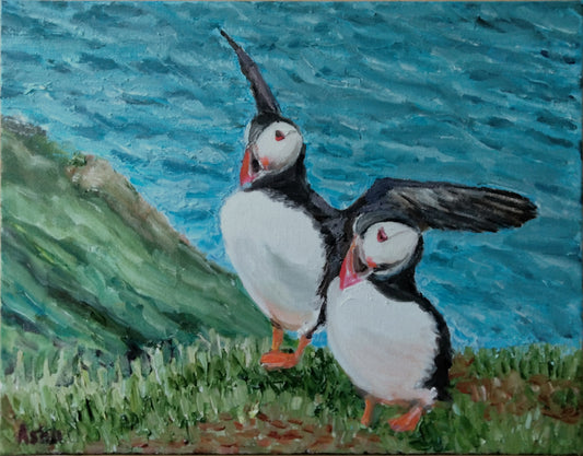 Painting of two young puffins pictured with the background of deep cyan blue ocean off the island of Shetland