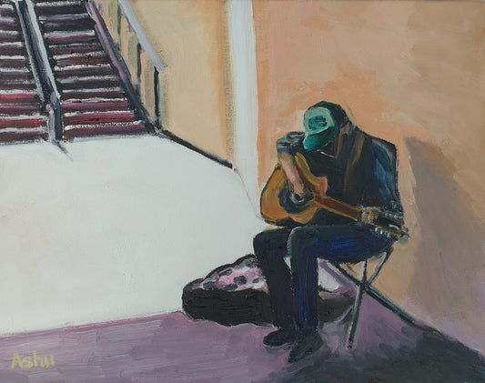 Painting of street musician playing guitar in a subway underpass