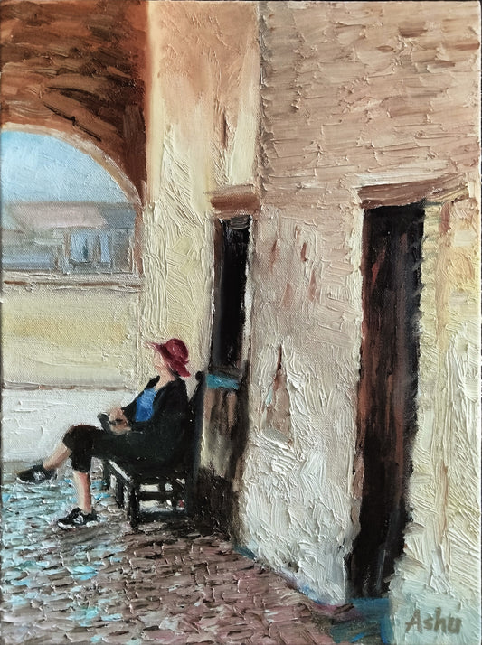Painting of a woman in a red hat sitting on a bench on the veranda at Mission San Juan Capistrano, California